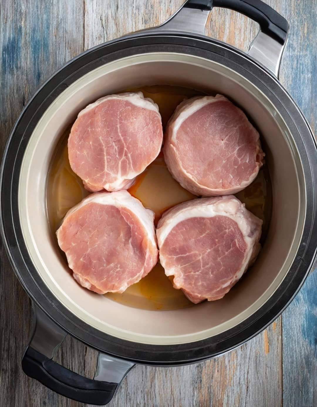 Put these 3 ingredients in a slow cooker for pork chops that melt in your mouth