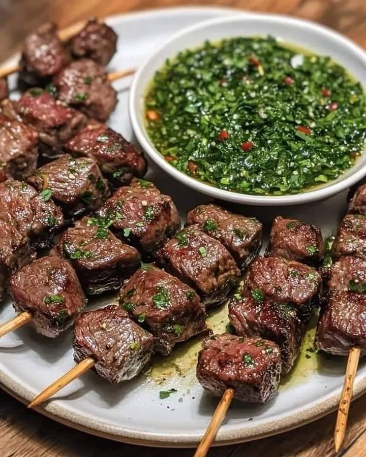 Spicy beef skewers with chimichurri sauce