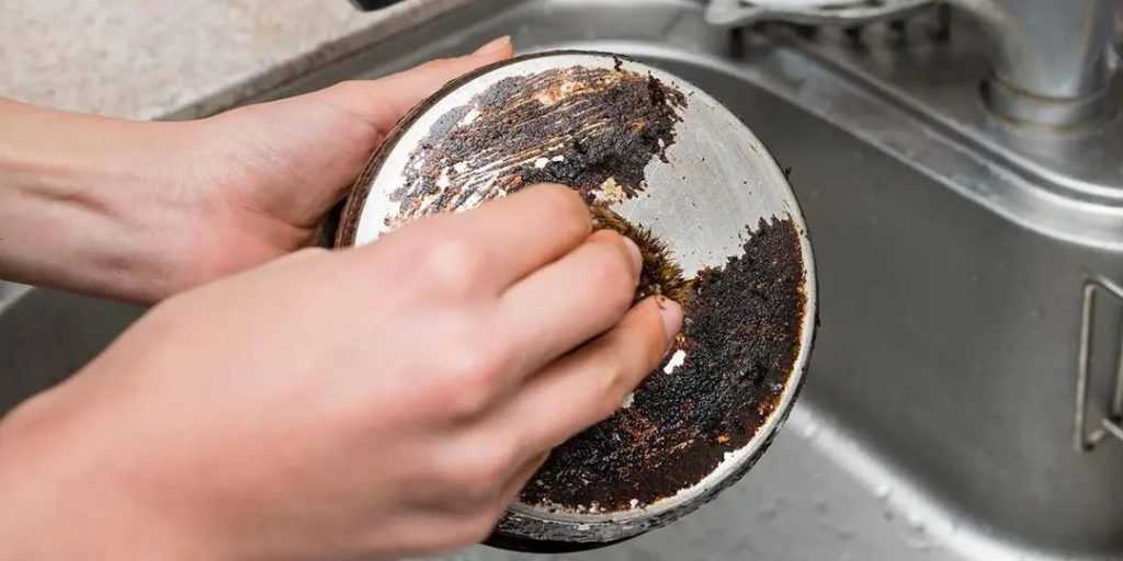 Learn how to clean the backs of pans and leave them looking like new