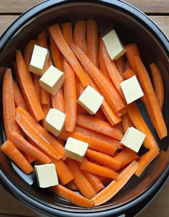 Put butter pats over carrots in slow cooker & get a tasty side dish in no time