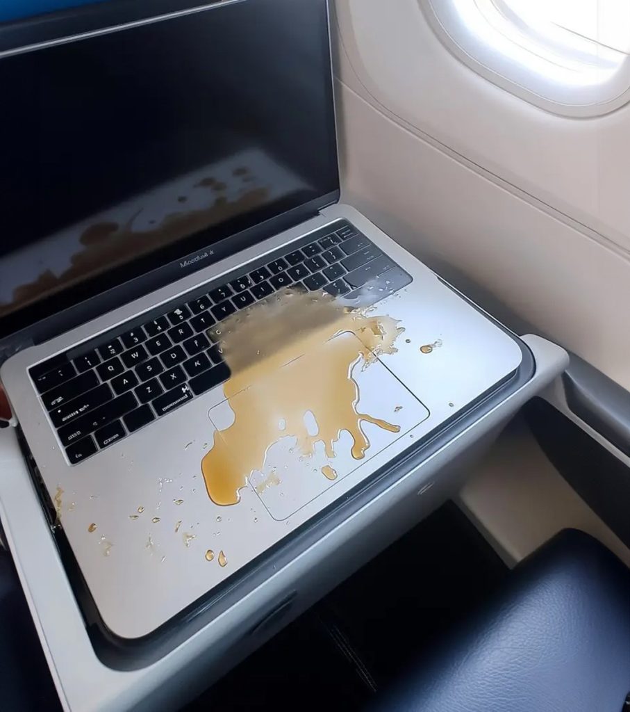 Entitled Passenger Spilled His Drink on My Laptop, Completely Ruining It – Karma Caught Up With Him as Soon as We Landed