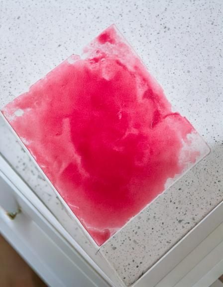 Pink post-it note got wet and left this stain on our stone countertop! Help!