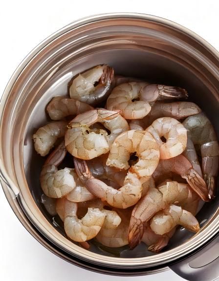 Put raw shrimp in a slow cooker with these 3 ingredients. It’s seafood heaven.