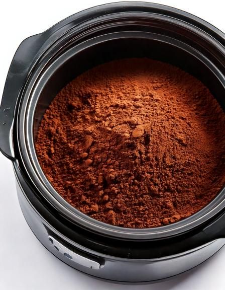 Put raw boxed chocolate cake mix in a slow cooker with these 3 ingredients. It’s the ultimate winter comfort dessert.