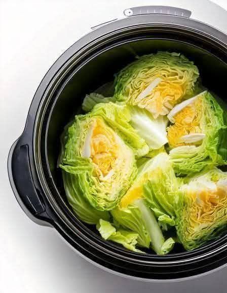 Put raw cabbage wedges in a slow cooker with these 3 ingredients. It’ll wow you